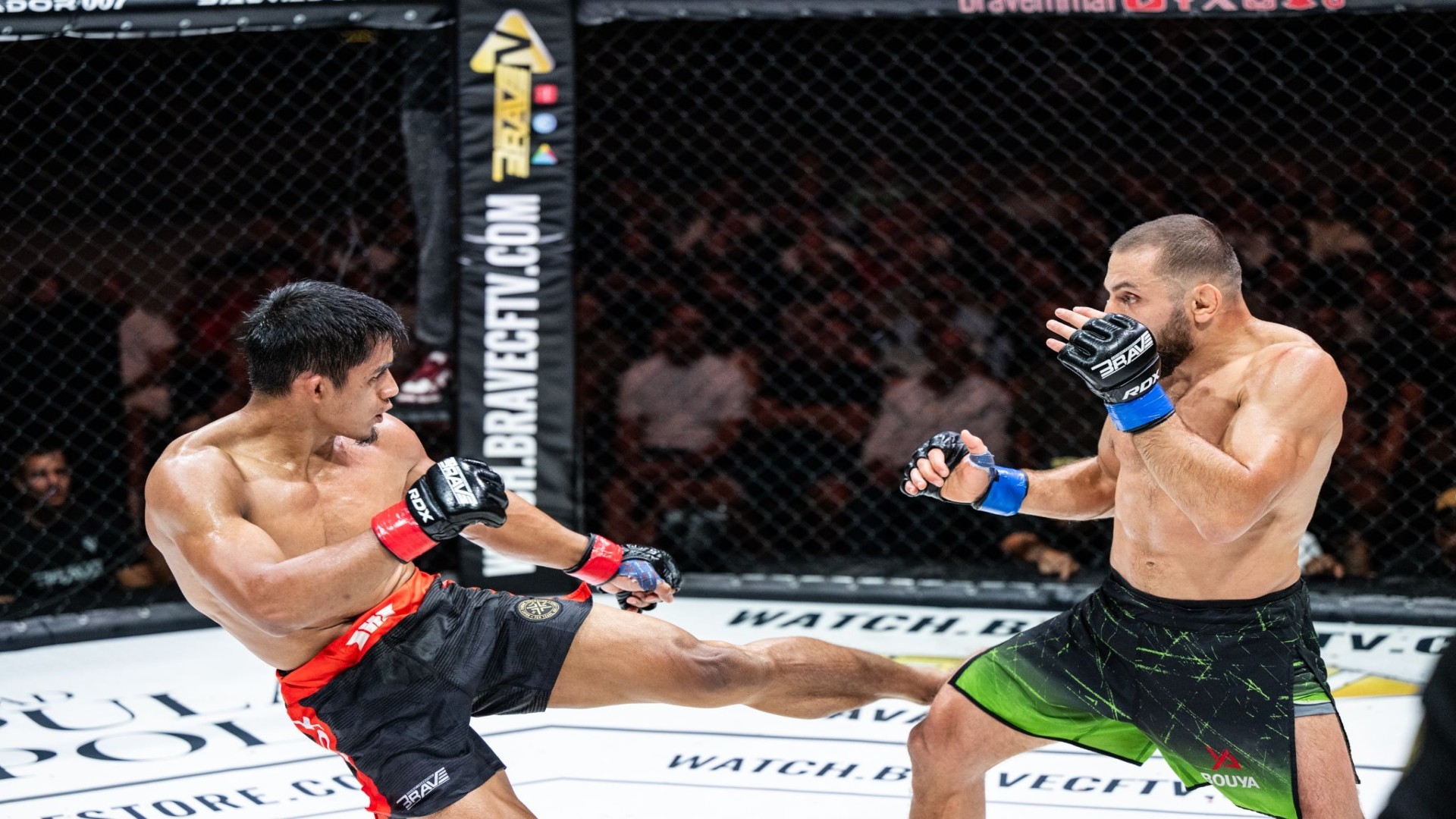 Stephen Loman exchanges strikes with Lasha Abramishvili during their BRAVE CF 108 co-main event at Pula Arena