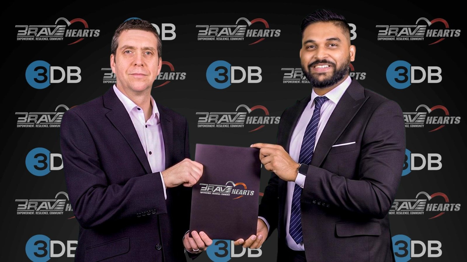 BRAVE Hearts Director Jabran Zakariya and 3DB Events General Manager Matt Dale sign a strategic partnership agreement to support business communities.