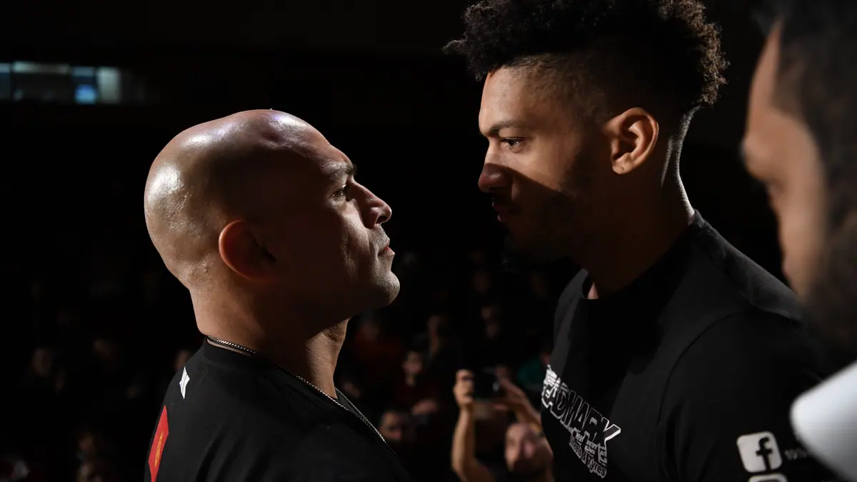 Hassan and Booth make weight and have intense staredown ahead of BRAVE CF 32