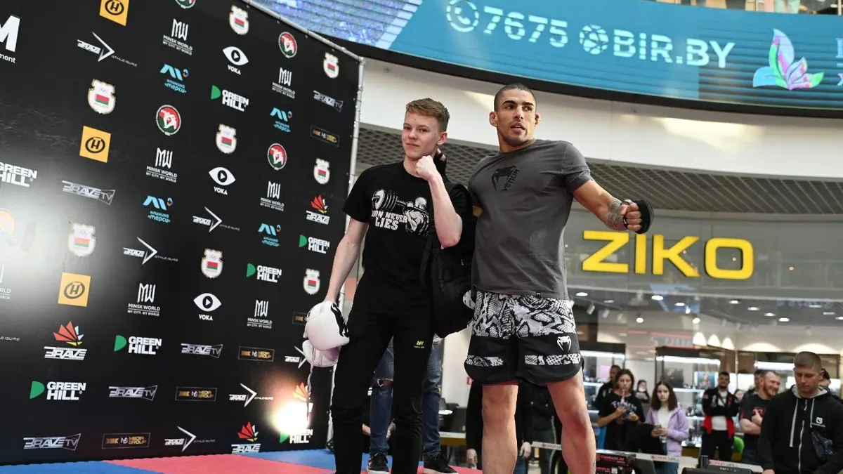 Young Belarusian MMA Fan Starstruck By Lucas Mineiro & Caio Castro Signed Gloves at BRAVE CF 51 Open Workout