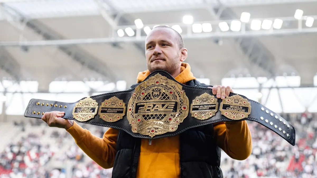 Champion Marcin Bandel receives heros welcome and parades BRAVE CF belt before football match in Poland